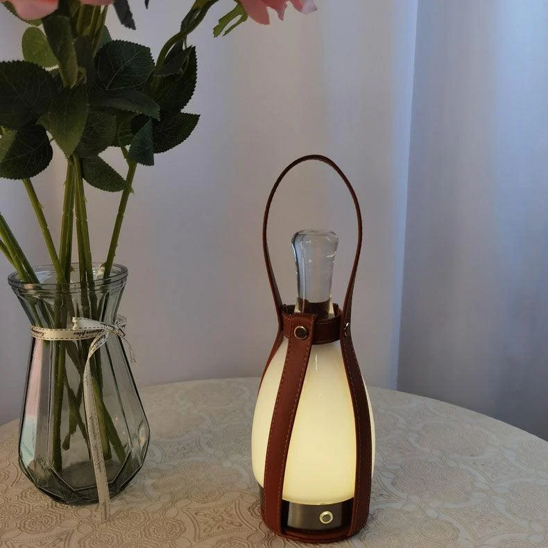 CreativeLeatherGlassBottlePortableRechargeableLEDTableLamp_1_4cd9d74a-5b5c-4bb1-859a-ebf90389a73a Creativeleatherglassbottleportablerechargeableledtablelamp 1 4cd9d74a 5b5c 4bb1 859a Ebf90389a73a