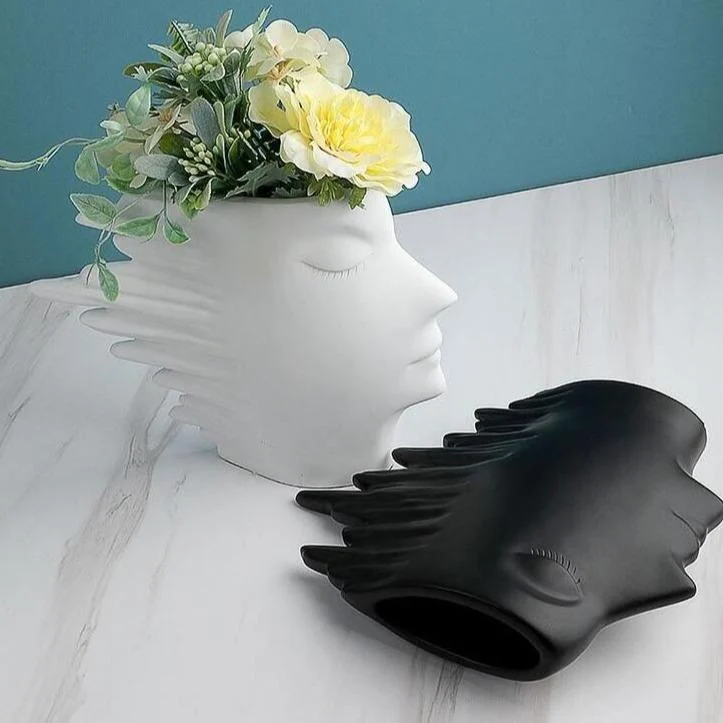 Faces_in_the_Wind_Vase_-_-4187010 Faces in the Wind Vase -