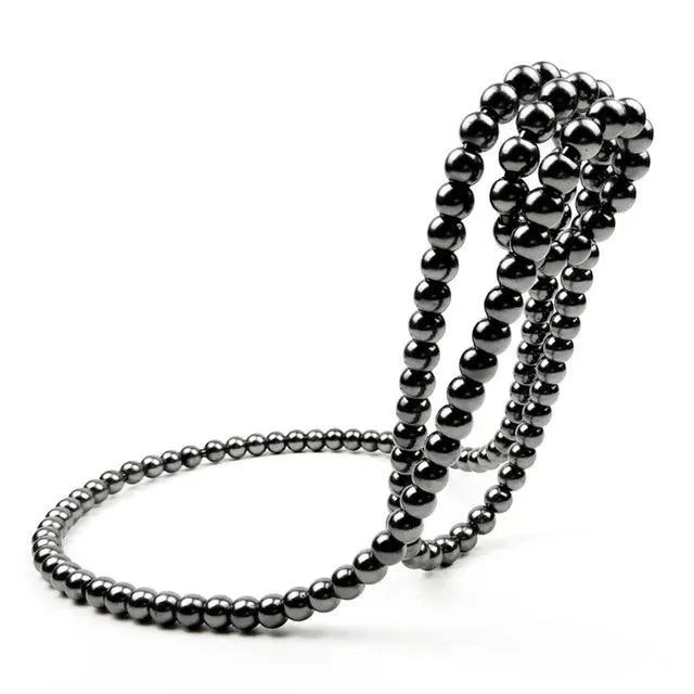 Gravity Defying Pearl Necklace Wine Rack - Homeko