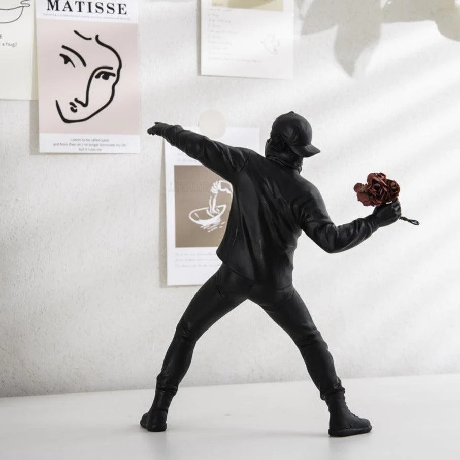 Homeko_Man_Throwing_Flowers_Sculpture_-_-4263105 Homeko Man Throwing Flowers Sculpture -