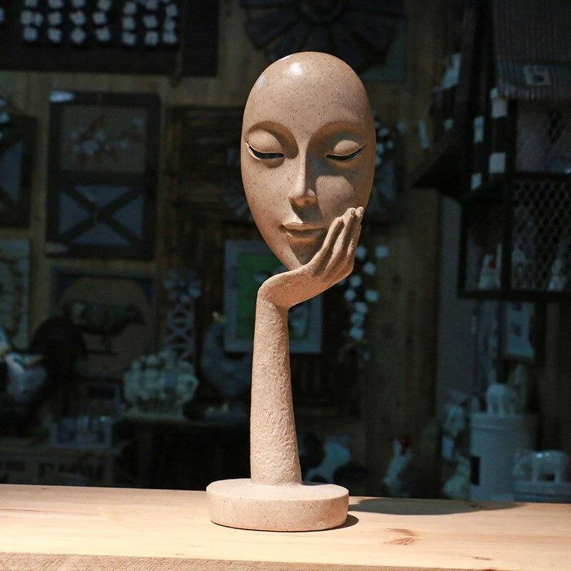 Homeko in Thought Statues -