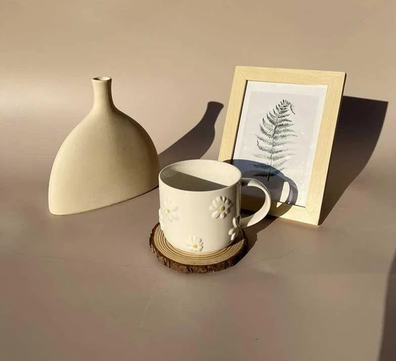 Minimalist_Ceramic_Embossed_Daisy_Mug_-_-4338072 Minimalist Ceramic Embossed Daisy Mug -