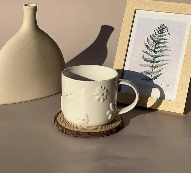 Minimalist_Ceramic_Embossed_Daisy_Mug_-_-4338077 Minimalist Ceramic Embossed Daisy Mug -